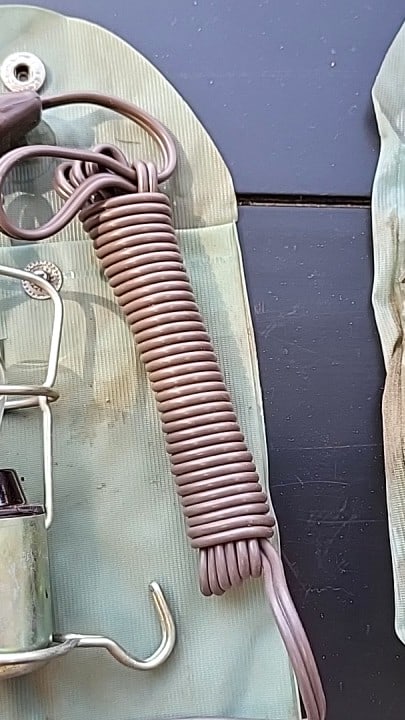 2 Vintage Portable Trouble Light Work Lamp With Metal Cage Hook Coiled Cord Vinyl Pouch: Untested 3. 5 x 6 x 3. 5 1 lb Low Estimate: 12.00 High Estimate: 45.00