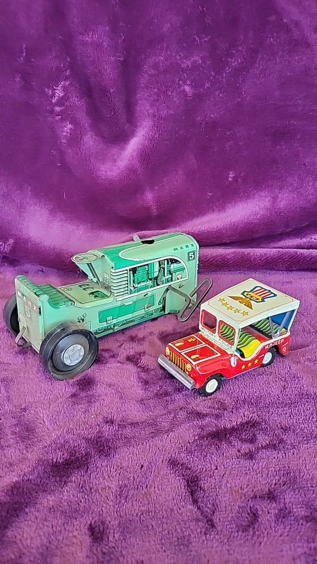 Marx No. 5 Green Tin Litho Wind-up Tractor Toy And Mp Jeep Japan Made Military Police Toy Car Read: Marx no. 5 missing back wheels 9x8x4 1lb Low Estimate: 65.00 High Estimate: 150.00