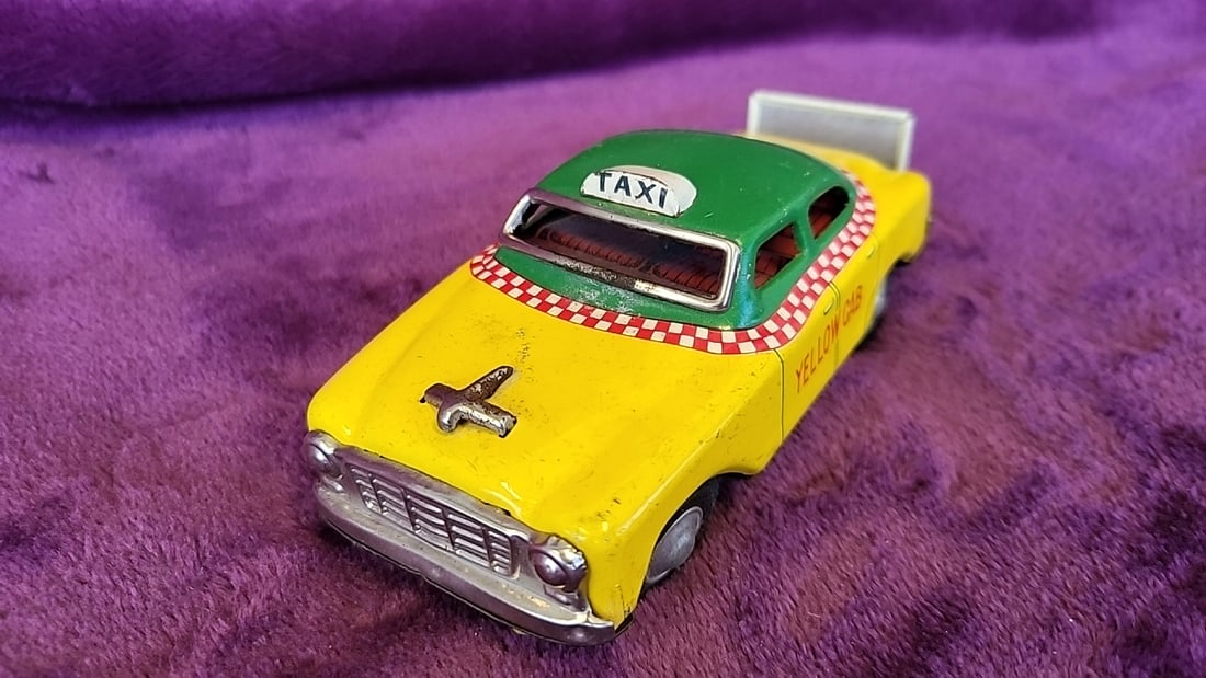 Made In Japan Tin Litho Yellow Cab Taxi Toy With Green Roof And Rear Safety Sign - 2