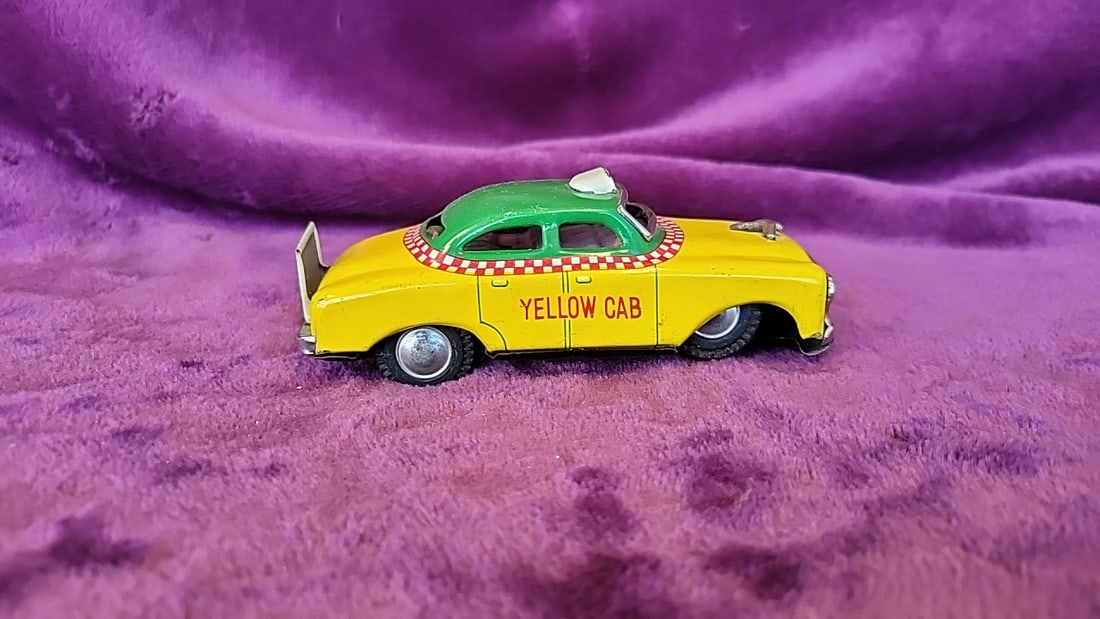 Made In Japan Tin Litho Yellow Cab Taxi Toy With Green Roof And Rear Safety Sign - 4