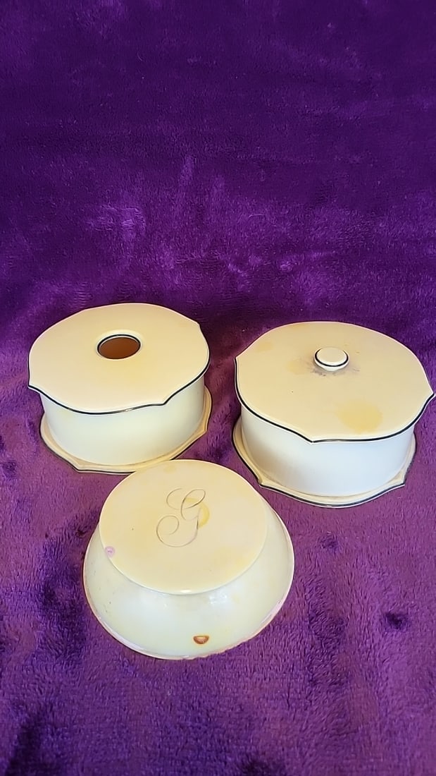 Cream Plastic Vanity Dresser Set With Powder Jar, Hair Receiver & Covered Box: 10x5x5 1lb Low Estimate: 12.00 High Estimate: 75.00