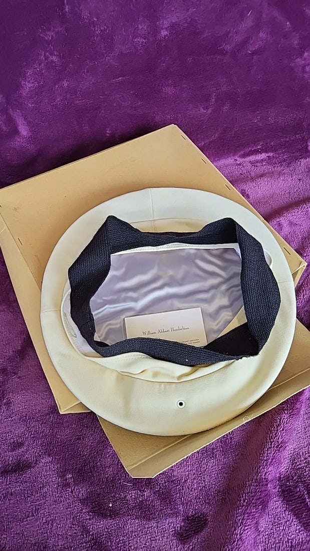 U.S. Air Force Chief Warrant Officer White Service Cap, William Abbott Hambleton: 11x11x4 1lb Low Estimate: 30.00 High Estimate: 450.00