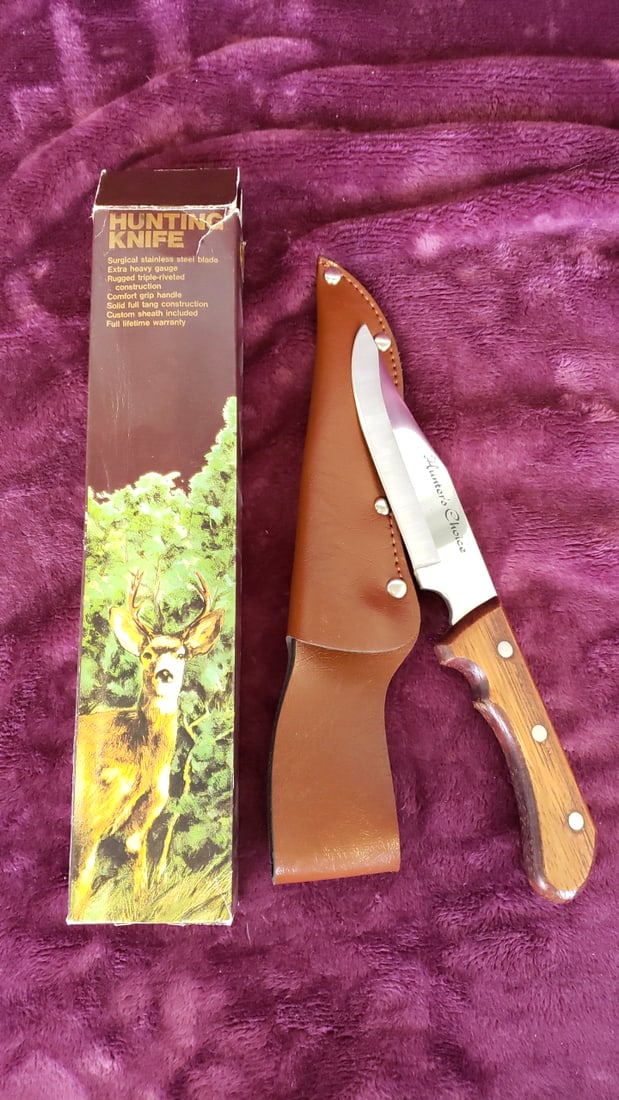 Hunter's Choice Stainless Fixed Blade Hunting Knife Wood Handle Leather Sheath Box Japan: 12x3x1 1lb Low Estimate: 18.00 High Estimate: 50.00