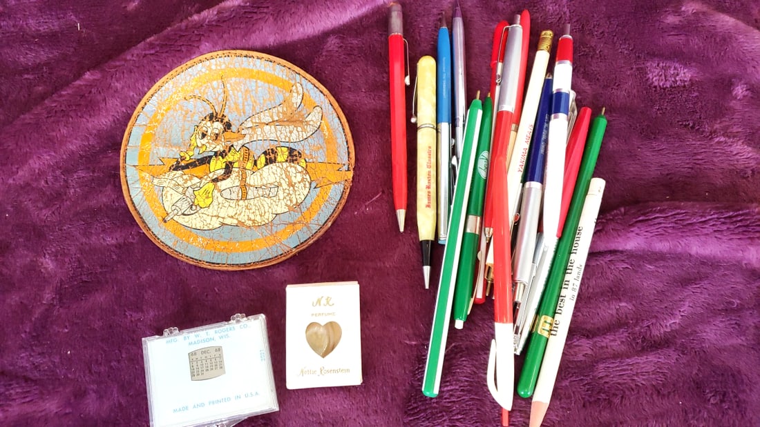 Vintage Advertising Pens Lot W.T. Rogers 1968 Calendar Nettie Rosenstein Kl Perfume Bee Round Pin: 9x6x2 1lb Low Estimate: 12.00 High Estimate: 35.00