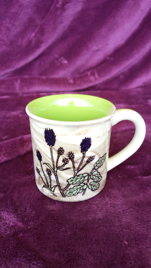 Ceramic Mug With Lime Green Interior And Botanical Thistle Floral Design: 5x4x3. 5 1lb Low Estimate: 3.00 High Estimate: 15.00