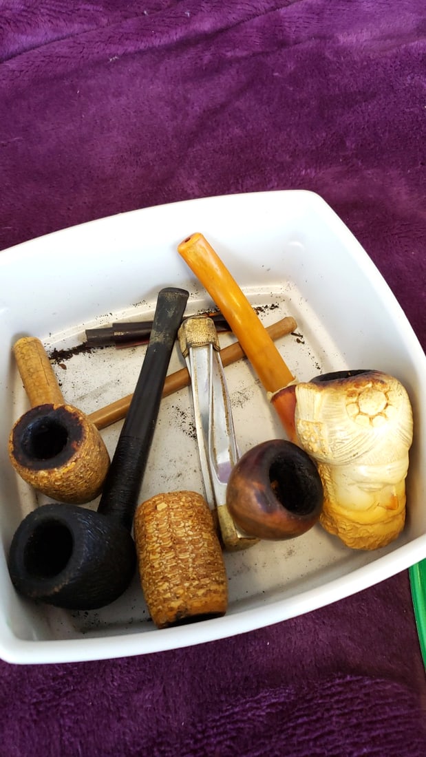Smoking Pipe Lot With Carved Figural Pipe And Santa Container: 7x7x3. 5 1lb Low Estimate: 15.00 High Estimate: 75.00