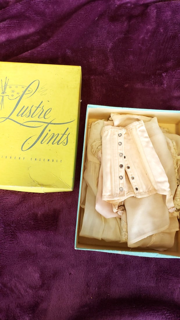 Lustre Tints Stationery Ensemble Box With Antique Doll Lingerie Corset Chemise Bloomers: 6. 5x9x3 1lb Low Estimate: 18.00 High Estimate: 150.00