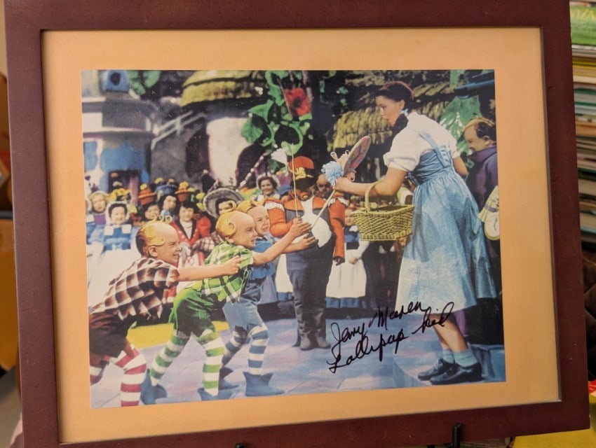 Autographed Pictures of Jerry Maren (2): Framed & Matted w/ Signing picture from July 2 2005 believed to be genuine but the autographs have NOT been authenticated