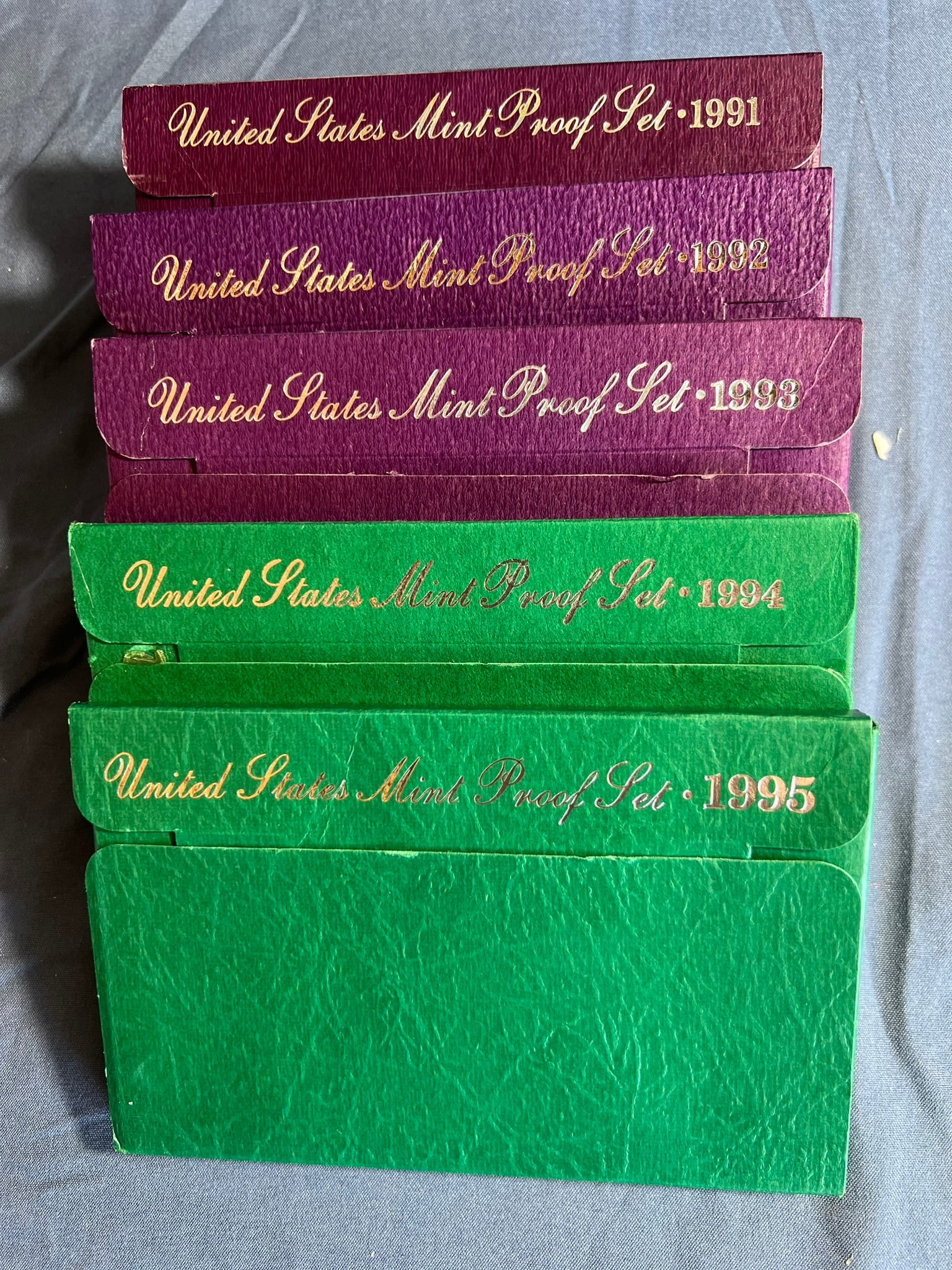 5 US Proof sets, 1991 S-1995S,1 set for each year: Each proof set has the ff: Lincoln cent, Jefferson nickel, Roosevelt dime, Washington quarter & Kennedy half dollar (5 coins per set). All sealed in original packaging and COA included.