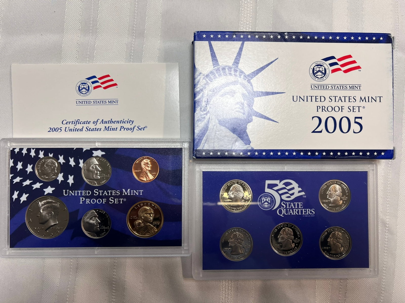 2005 S Proof Set, 11 Coins PR: Proof Set. Lincoln cent, 2 Jefferson nickel, Roosevelt dime, 5 State quarters, Kennedy half dollar & Sacagawea dollar (10 coins), in original packaging and COA included.