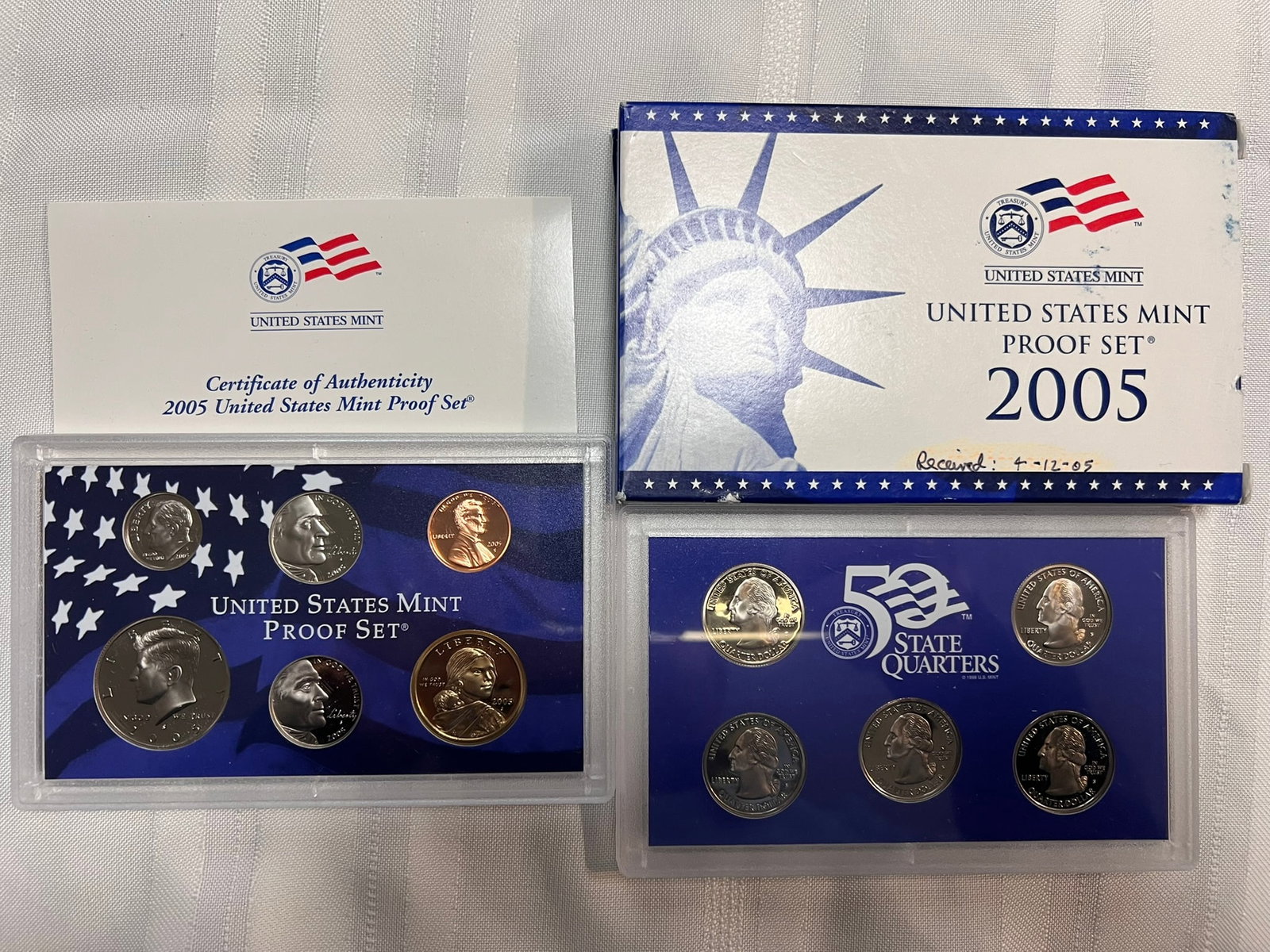 2005 S Proof Set, 11 Coins PR: Proof Set. Lincoln cent, 2 Jefferson nickel, Roosevelt dime, 5 State quarters, Kennedy half dollar & Sacagawea dollar (10 coins), in original packaging and COA included.