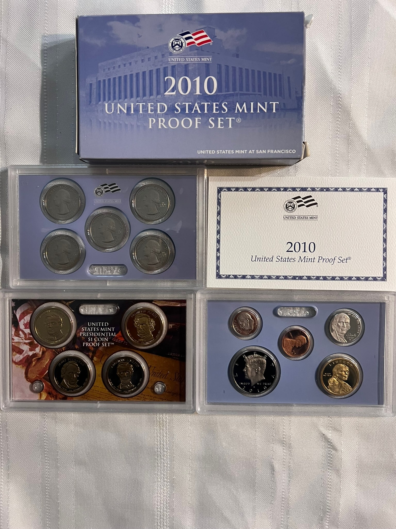 2010 S Proof Set, 14 Coins PR: Proof Set. Lincoln cent, Jefferson nickel, Roosevelt dime, 5 State quarters, Kennedy half dollar, Sacagawea dollar & 4 Presidential dollars (14 coins), in original packaging and COA included.