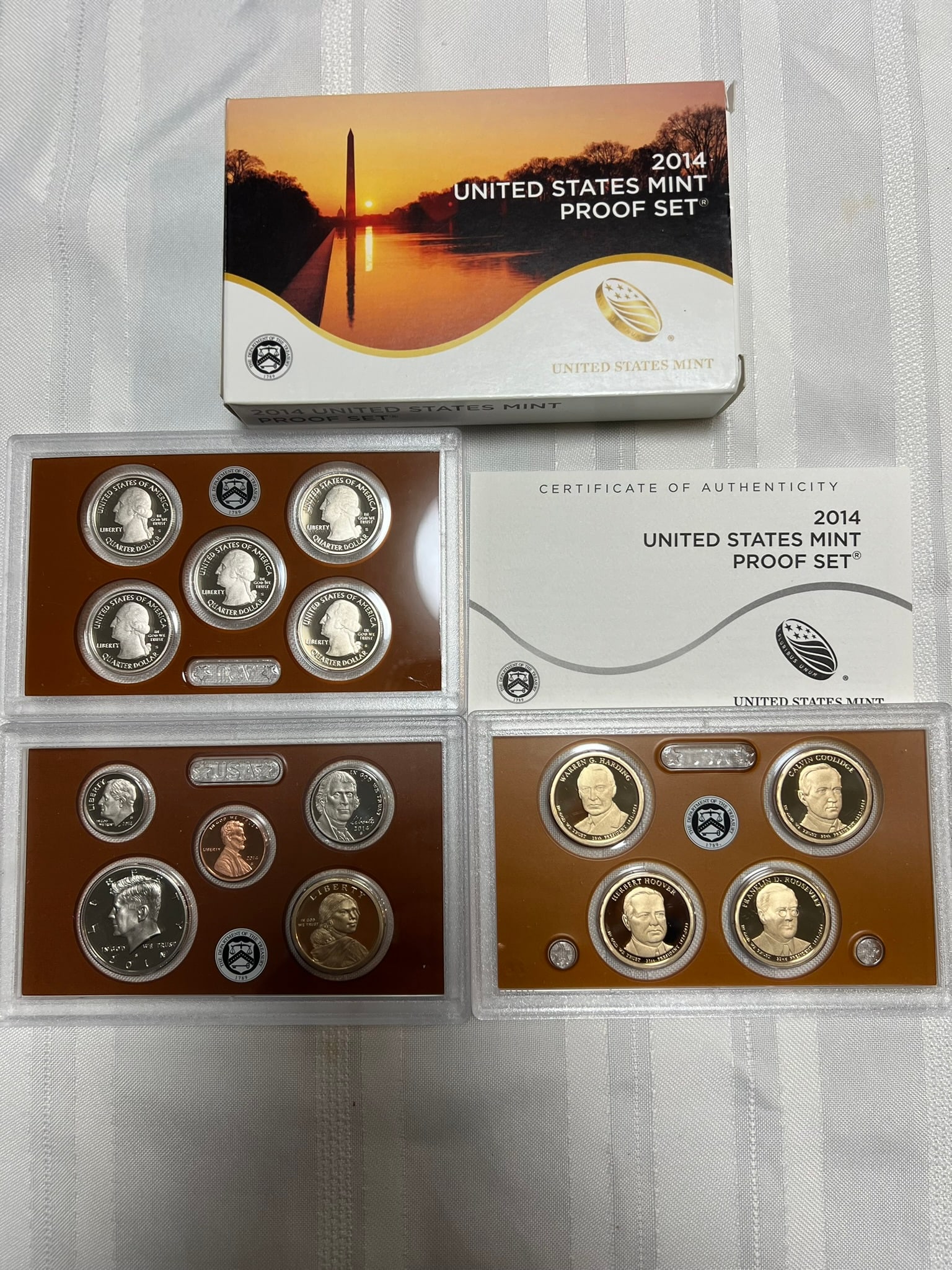 2014 S Proof Set, 14 Coins PR: Proof Set. Lincoln cent, Jefferson nickel, Roosevelt dime, 5 State quarters, Kennedy half dollar, Sacagawea dollar & 4 Presidential dollars (14 coins), in original packaging and COA included.