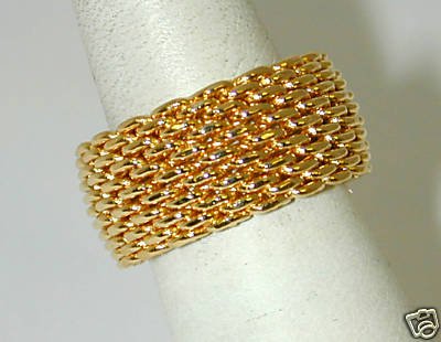 Tiffany & Co. 18K Yellow Gold Ring: Tiffany & Co. 18K Yellow Gold Ring. The total weight is 12.2 g. Ring size is 5. There are Tiffany and 750 stamp in the ring. This is 100% Tiffany ring.