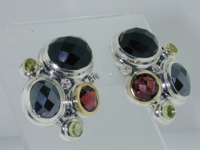 David Yurman18kGold/Silver Multi Stone Diamond Ear: This is David Yurman 18K Yellow Gold & Silver, Onyx, Albion Hematite, Rhodolite, Peridot, Diamond Earrings! Earring's Weight : 19.8 grams. The Total weight of diamonds is 5pts.. approximately and I co