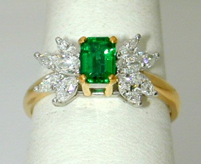 91: Tiffany & Co. Plat and 18KY Gold Em: Tiffany & Co. Plat and 18KY Gold Emerald With Diamond Ring, the total weight is 3.5g, the size of the ring is 5.75, the total diamond weight is 1.0 cts, G color VS clarity. there is the Tiffany & Co. 