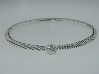 David Yurman Silver Diamond Bangle: David Yurman Silver Diamond Bangle! Bangle's Weight : 11.3 grams.Total diamonds weight: 10 pts, I color, SI-1 clarity.The measurements of the inside Bangle are 55 x 54 mm and the thickness is 3.5 mm.T