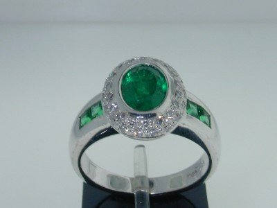 Craig Drake 18K White Gold Emerald / Diamond : This is a wonderful Authentic Craig Drake 18K White Gold Emerald and Diamond Ring. The total ring's weight is 8.7 grams. The total weight of Emerald is approximately 3.0cts. The total diamonds weight 