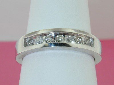 14k White Gold Diamond Wedding Ring,: This is a Wonderful 14K White Gold Diamond Men's Wedding Ring ! The total ring's weight is 7.7 grams. The total diamond weight is 0.5 ct. , approxmiately, H color, SI1 clarity. The size of the ring is