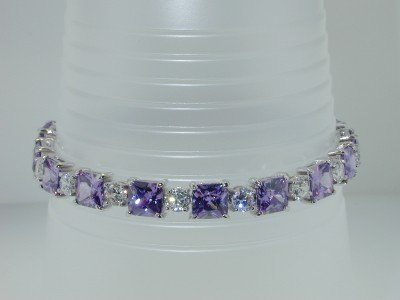 Silver & Muti-Color GemStones Bracelets: Silver & Muti-Color GemStones Bracelets. The bracelet's weight is 18.5 grams. There are 17 Amethyst on the bracelet , size 6 x 6 mm each. There are 17 Cube Zircon on the bracelet , weight :20 pts, eac