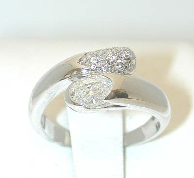 30: 30: BVLGARI 18K White Gold Diamond: BVLGARI 18K White Gold Diamond Ring, the total weight is 4.9 g, the size of the ring is 7.25, the total diamond weight is 0.56 cts, the center stone is 0.40 cts and the side is 0.16 cts, G color, VS c