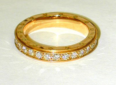 39: 39: MAUBOUSSIN PARIS 18K Yellow Gol: MAUBOUSSIN PARIS 18K Yellow Gold Ring w/ Diamonds, the total weight is 7.4 g, the size of the ring is 7.5, the total diamond weight is approximately 1.0 cts, G color, VS clarity. There is the Maubouss