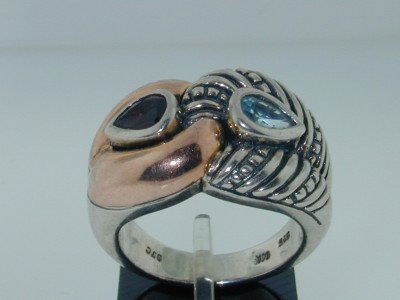 26: BJC14k Gold/Silver Rhodalite Aquama: BJC 14k Yellow Gold/Silver Rhodolite, Aquamarine Ring. The total ring's weight is 11.8 grams.The measurement of the ring's face is 22x14 mm, Thickness: 7 mm.The size of the Rhodalite and Aquamarine is