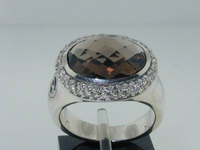 David Yurman Silver Smoky Topaz Diamond Ring !!: This is a Wonderful David Yurman Silver Smoky Topaz Diamond Ring. The total ring's weight is 7.5 grams.The size of Smoky Topaz is 15x11 mm.The total weight of diamonds is 50 pts. approximately I color