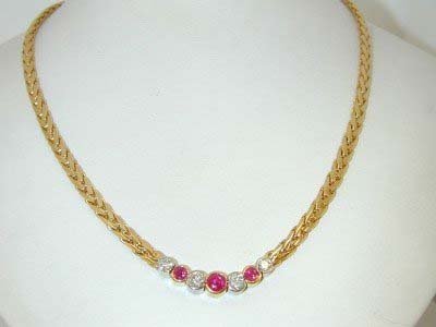 Craig Drake 18K Two Toned Necklace!!: Craig Drake 18K Two Toned (Yellow-White) Gold Ruby Diamond Necklace. The total weight of Necklace is 46.1 grams. The total weight of the Diamond is 1.5 cts approximately, G color VVS clarity. The tota