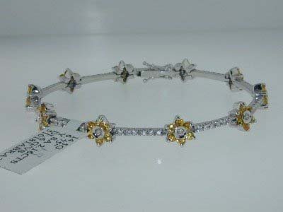 Craig Drake 18K Diamond Bracelet !!: Craig Drake 18Kt White Gold, Yellow Sapphire & Diamond Bracelet. The weight of bracelet is 14.5 grams. The total Yellow sapphire weight is 2.16 ct,approximately . The total diamonds weight is 0.6 ct,a