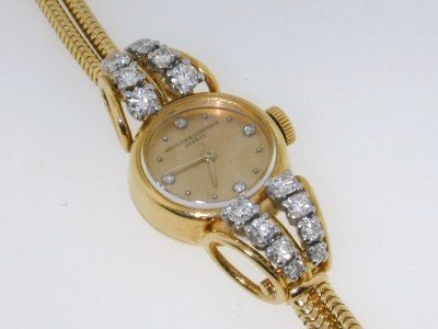 Authentic Vacheron & Constantin18K Gold Diamond Wat: 100% Authentic Vacheron & Constantin 18K Yellow Gold Diamond Watch! The total weight of the watch is 27.4 grams. The diamonds weight are approximately 1ct in total, G color and VS clarity. The size of