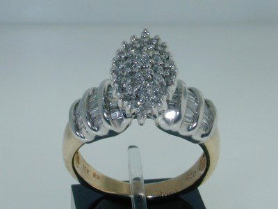 10K Two-tone Gold Diamond Ring.: This is a Wonderful 10K Two-tone Gold Diamond Ring. The total ring's weight is 6.3 grams. Total weight of diamond: 1.1 cts, approximately, I color, SI clarity The size of the ring is 7" This is a beau