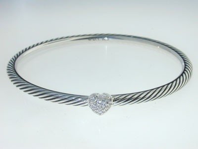 David Yurman Silver Diamond Bangle!!: David Yurman Silver, Diamond Bangle. The total Bangle's weight is 11.4 grams. The total diamond weight is 14 pts approxmiately, I color VS clarity. The measurement of the inside bangle is 55x55 mm, Th
