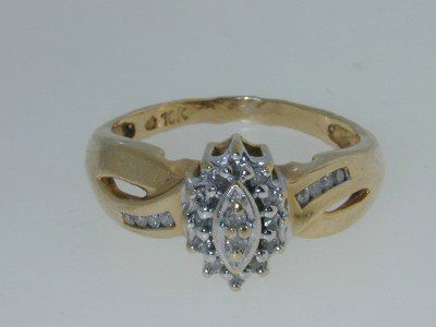 10K Two-tone Gold Diamond Ring!!!: This is a Wonderful 10K Two-tone Gold Diamond Ring. The total ring's weight is 4 grams. Total weight of diamond: 22 pts, approximately, I color, SI clarity The width of ring's face: 10 mm The size of