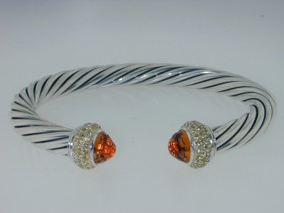David Yurman Silver, Citrine, Yellow Sapphire B: David Yurman Silver, Citrine & Yellow Sapphire Bangle.The total Bangle's weight is 32.2 grams.The total Yellow Sapphire weight is 65 pts approximately.The size of Citrine : 8 mm in diameterThe measure