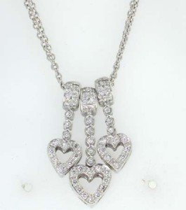 Gregg Ruth 18K White Gold Diamond Necklace.: Greeg Ruth 18K White Gold Diamond Necklace. The total necklace's weight is 11.8 grams. The total diamond weight is 0.6 cts approxmiately. I color SI-1 clarity. The size of the pendant is 25x7 mm, Thic