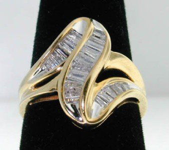 10k Yellow Gold Diamond Ring: 10k Yellow Gold Diamond Ring, The total ring's weight is 5.2 grams. The total diamond weight is 2.0cts,approxmiately. I color, SI clarity. The dimensions of the ring's face is 20x20 mm. thickness: 4 m