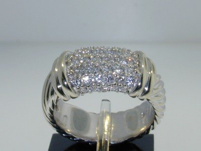 David Yurman 18K Gold Diamond Ring!: This is a Wonderful David Yurman Diamond Ring in 18K Gold. The total ring's weight is 8.6 grams, 8 mm wide. The total diamond weight is 40 pts, H color, VS1 clarity. The size of the ring is 5.25. This