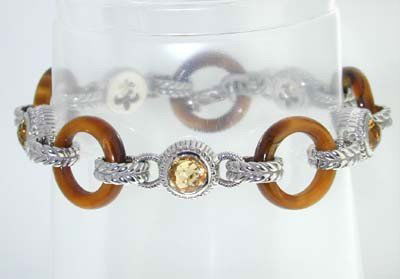 Judith Ripka Silver Bracelet.: The is a beautiful Judith Ripka Silver Bracelet. The total bracelet's weight is 25.3 grams. The bracelet is 7.75" long. This is a beautiful bracelet!