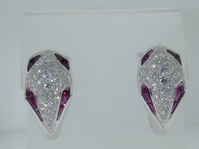 Craig Drake 18K White Gold Ruby / Diamond Earrings: Craig Drake 18K White Gold Diamond / Ruby Earrings! The total earrings weight is 14.5 grams. Total weight of diamond is 1.25 ct. approximately. G color VVS clarity. Total Ruby (French cut) weight is 3