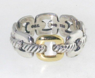 David Yurman Silver & 18K Yellow Gold Ring.: David Yurman Silver & 18K Yellow Gold Ring. The total ring's weight is 4.5 grams. The size of the ring is 7.25