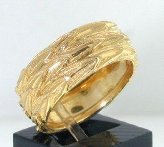 Buccellati 18K Yellow Gold Ring: Buccellati 18K Yellow Gold Ring. The total ring's weight is 7.6 grams. The size of the ring is 7.25. This is a wonderful ring !