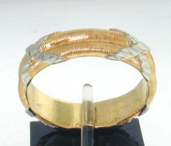 Buccellati 18K Two-toned Gold Ring: Buccellati 18K Two-toned (White & Yellow) Gold Ring. The total ring's weight is 6.3 grams. The size of the ring is 8.25 This is a wonderful ring !