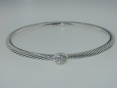 David Yurman Silver, Diamond Bangle: David Yurman Silver, Diamond Bangle! Bangle's Weight : 11.3 grams.Total diamonds weight: 10 pts, I color, SI-1 clarity.The measurements of the inside Bangle are 55 x 54 mm and the thickness is 3.5 mm.