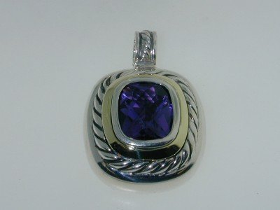 David Yurman Silver & 14K Gold Amethyst Pendant.: David Yurman Silver & 14K Gold Amethyst Pendant. The weight of the Pendant is 14.7 grams. The size of the Amethyst is 11 x 9 mm. The size of the pendant is 32 mm in length, 23mm in wide, 12 mm in thic