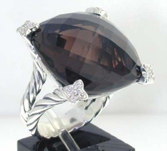 David Yurman Silver Smoky Topaz & Diamond Ring.: This is a Wonderful David Yurman Silver Smoky Topaz & Diamond Ring. The total ring's weight is 13.3 grams.The total weight of the diamond is 0.25 cts approximately, H color VS clarity.The size of the 