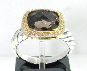 David Yurman Silver Smoky Topaz Diamond Ring: David Yurman Silver Smoky Topaz Diamond Ring.The total ring's weight is 5.3 grams.The total weight of the diamond is 0.24 cts approximately, I color SI clarity.The size of the Smoky Topaz is 10 x 8 mm