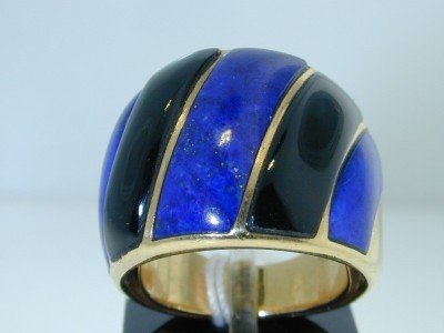 Cartier 18k Yellow Gold Lapis & Onyx Ring.: Cartier 18k Yellow Gold Lapis & Onyx Ring. The total ring's weight is 12.9 grams. The size of the bigger lapis is 6 mm in wide. The size of the smaller lapis is 4 mm in wide. The size of the each Onyx