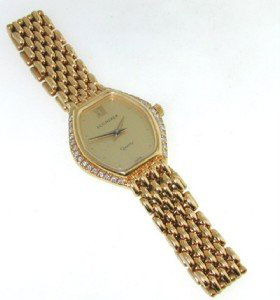 Bucherer 18K Yellow Gold Diamond Wrist watch.: Bucherer 18K Yellow Gold Diamond Wrist watch. Watch's Weight :31.9 grams. Total weight of diamonds: 0.6 cts, I color, VS clarity. The length of watch: 5" . Swiss made