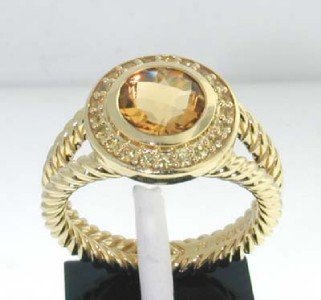David Yurman 18K Gold Citrine , Yellow Sapphire Ri: David Yurman 18K Yellow Gold Citrine, Yellow Sapphire Diamond Ring The total ring's weight is 9.7 grams. The total weight of Yellow Sapphire: 0.42 cts approximately The size of the Citrine is 8x8 mm. 